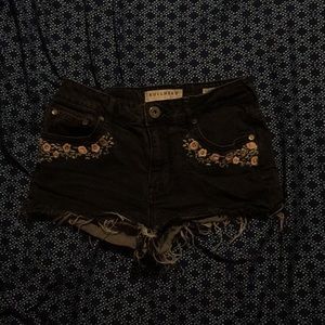 Cute black shorts with light pink flowers